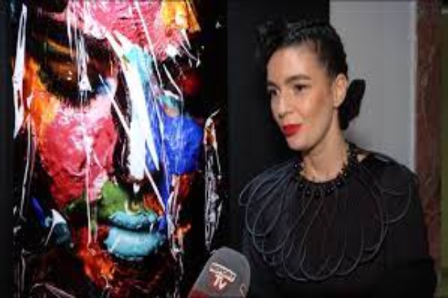 Linda Guri and photographer Ergys Zhabjaku open an exhibition