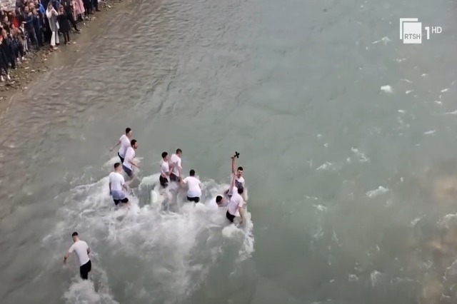 The Blessed Water Day, ceremonies all over the country, young people immerse themselves into water to grab the Cross