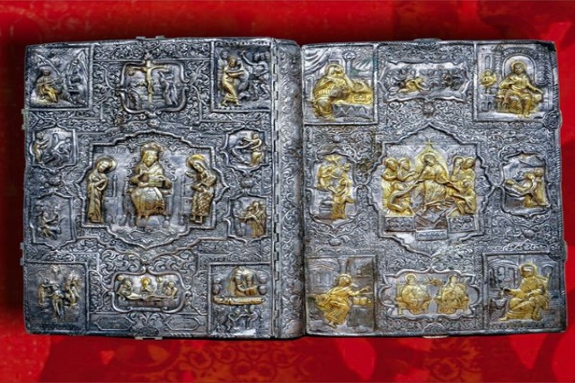Gospel covers crafted in gold and silver, displayed on one of the stands of the Iconographic Museum”Onufri”